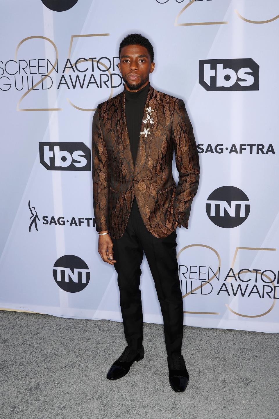 Chadwick Boseman in Ermenegildo Zegna XXX and Christian Louboutin shoes with Tiffany & Co. jewelry