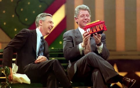 Fred Rogers with Bill Clinton, in 1993 - Credit: AFP