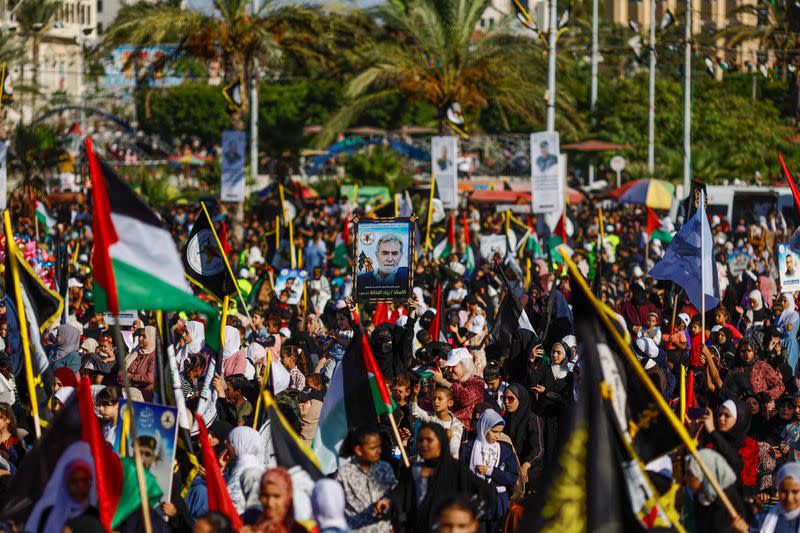 Palestinian Islamic Jihad militants participate in an anti-Israel military parade marking the 36th anniversary of the movement's foundation in Gaza City