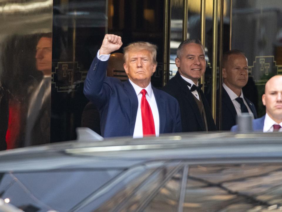 ormer US President Donald Trump exits Trump Tower to attend court for his arraignment