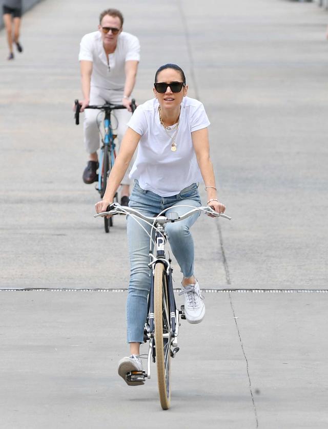 Jennifer Connelly takes her son Kai and husband Paul Bettany to