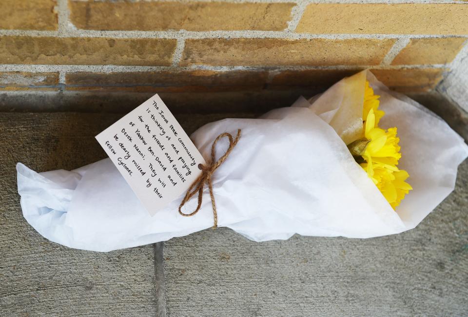 A memorial at the Iowa State University Campanile in Central Campus Thursday, April 1, 2021, for two Iowa State University Crew club members Yaakov Den-David and Derek Nanni were killed in a boat accident during practice at Little Wall Lake Sunday in Jewel, Iowa.