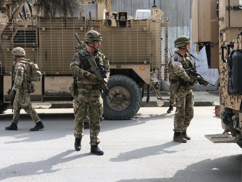 British soldiers with NATO-led Resolute Support Mission arrive at the site of an attack in Kabul