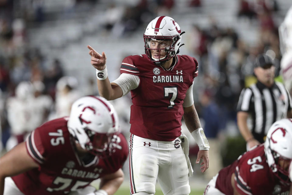 South Carolina quarterback Spencer Rattler (7) signals to a wide receiver during the second half of the team's NCAA college football game against South Carolina State on Thursday, Sept. 29, 2022, in Columbia, S.C. (AP Photo/Artie Walker Jr.)