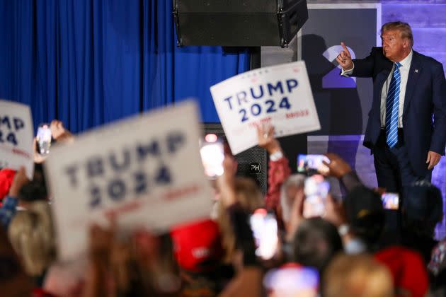 Republican presidential candidate former U.S. President Donald Trump gestures to the crowd after speaking during the Team Trump Nevada Commit to Caucus Event at Stoney's Rockin' Country on Oct. 28 in Las Vegas, Nevada.