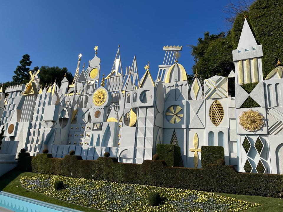 exterior shot of it's a small world at Disneyland