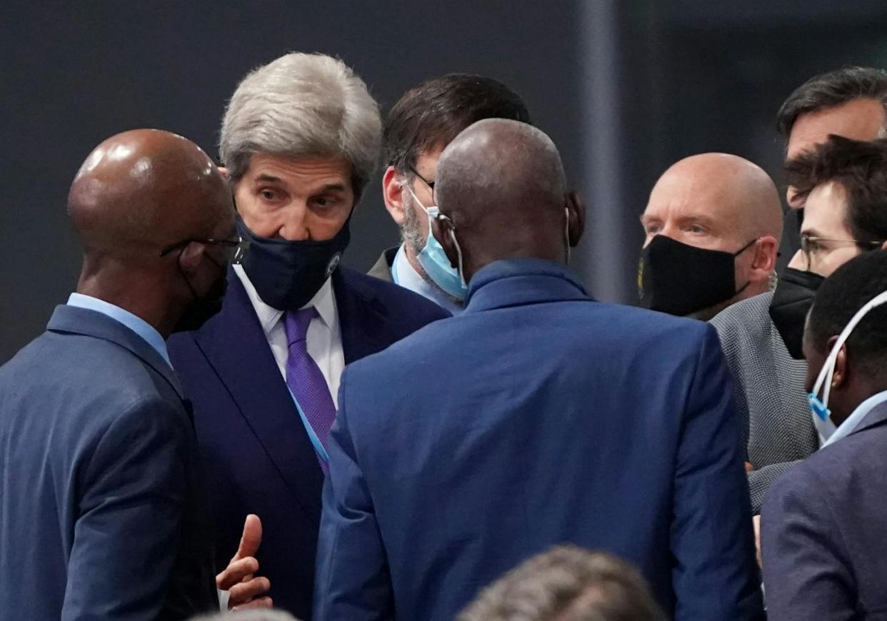 U.S. Special Climate Envoy John Kerry, second from left, during climate negotiations in 2021. <a href="https://www.gettyimages.com/detail/news-photo/special-presidential-envoy-for-climate-john-kerry-news-photo/1236536228?adppopup=true" rel="nofollow noopener" target="_blank" data-ylk="slk:Ian Forsyth/Getty Images;elm:context_link;itc:0;sec:content-canvas" class="link ">Ian Forsyth/Getty Images</a>