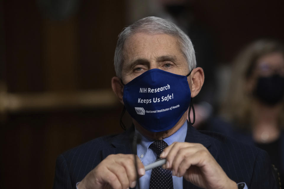 Dr. Anthony Fauci, Director of the National Institute of Allergy and Infectious Diseases at the National Institutes of Health, listens during a Senate Senate Health, Education, Labor, and Pensions Committee Hearing on the federal government response to COVID-19 Capitol Hill on Wednesday, Sept. 23, 2020, in Washington. (Graeme Jennings/Pool via AP)