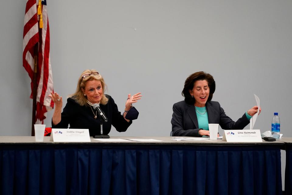 U.S. Rep. Debbie Dingell, left, shares a light moment with U.S. Secretary of Commerce Gina Raimondo, as they gather to talk the CHIPS Act during a roundtable discussion on Monday, Nov. 29, 2021 at the UAW Region 1A Stephen P. Yokich Auditorium in Taylor.
