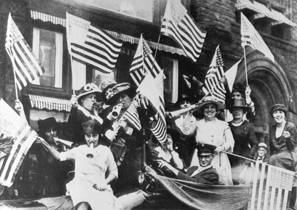 Suffragists celebrate after American women won the right to vote as the 19th Amendment to the Constitution went into effect Aug. 26, 1920.
