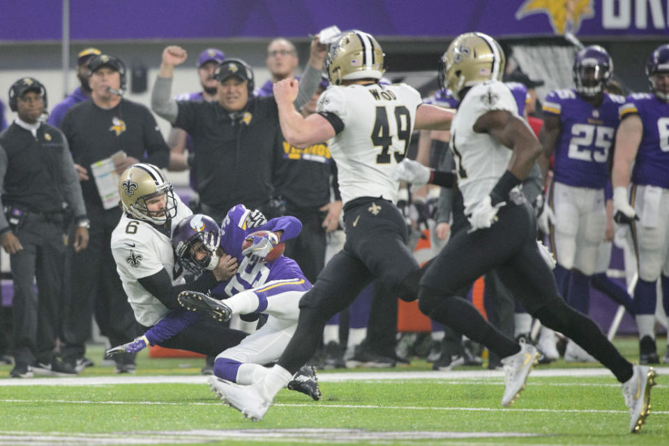 Thomas Morstead injured himself on this tackle of Minnesota’s Marcus Sherels. But better times were ahead. (Getty)