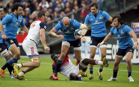 Rugby Union - France vs Italy - Stade de France, Paris, France - 6/2/16. Italy's Sergio Parisse (C) in action during their Six Nations tournament match. REUTERS/Gonzalo Fuentes