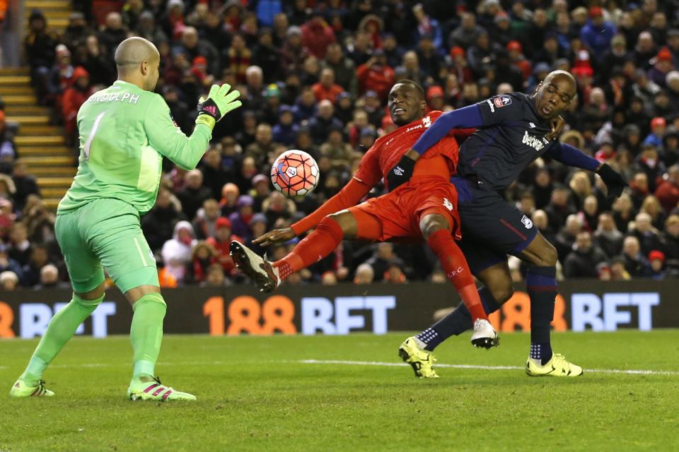 Football Soccer - Liverpool v West Ham United - FA Cup Fourth Round - Anfield - 30/1/16 Liverpool's Christian Benteke in action against West Ham United's Angelo Ogbonna Action Images via Reuters / Carl Recine Livepic EDITORIAL USE ONLY. No use with unauthorized audio, video, data, fixture lists, club/league logos or "live" services. Online in-match use limited to 45 images, no video emulation. No use in betting, games or single club/league/player publications. Please contact your account representative for further details.