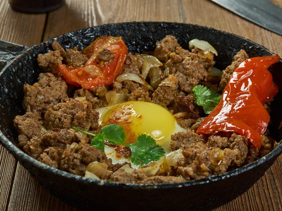 Makhlama Lahm - Iraqi Eggs with Lamb and Tomatoes, breakfast dish, ground lamb is sautéed with onions, tomatoes, and parsley, seasoned