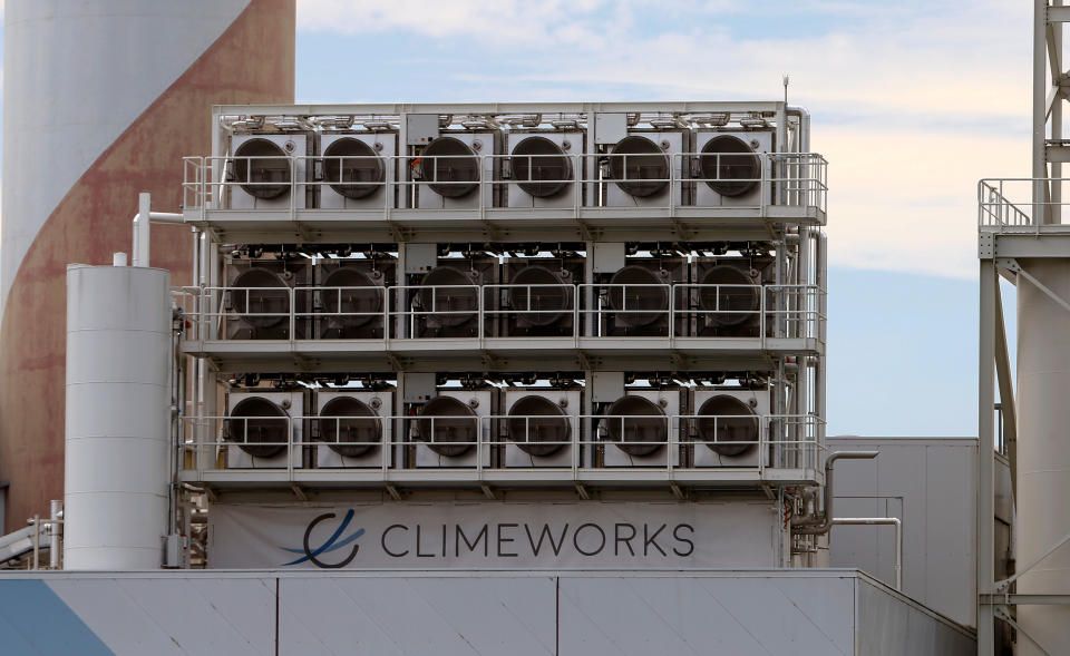 A facility for capturing CO2 from air of Swiss Climeworks AG is placed on the roof of a waste incinerating plant in Hinwil, Switzerland July 18, 2017. Picture taken July 18, 2017. REUTERS/Arnd Wiegmann