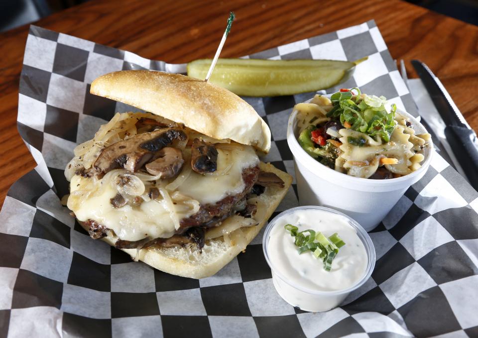 G Mig's 5th Street Pub in Valley Junction serves a prime rib burger.