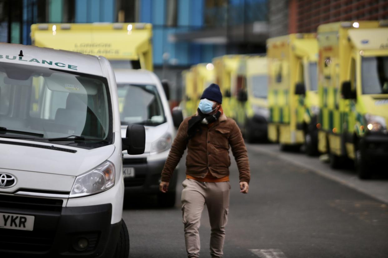 LONDON, UNITED KINGDOM - DECEMBER 29: A great number of ambulances wait outside London Royal Hospital as the number of coronavirus (Covid-19) cases surge due the new variant that considerably more transmissible than previous strains in London, United Kingdom on December 29, 2020. (Photo by Hasan Esen/Anadolu Agency via Getty Images)