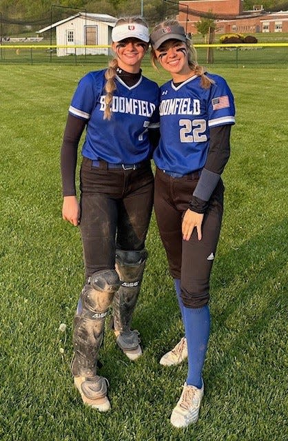 Bloomfield's battery. Catcher Calla McCombs, left, and pitcher Ashlyn Wright.