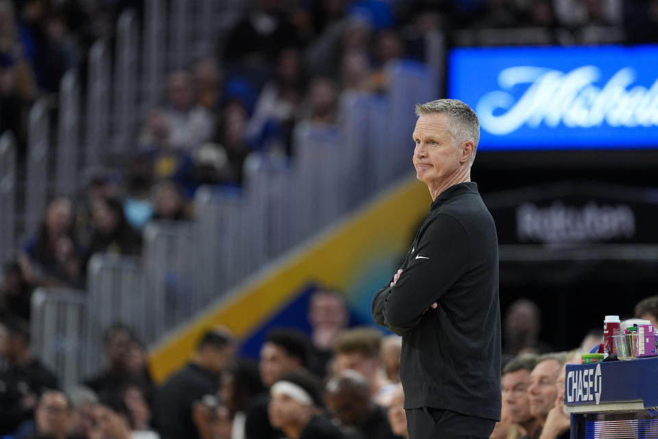 Golden State Warriors head coach Steve Kerr watches during the first half of an NBA basketball game against the Atlanta Hawks, Wednesday, Jan. 24, 2024, in San Francisco. (AP Photo/Godofredo A. Vásquez)