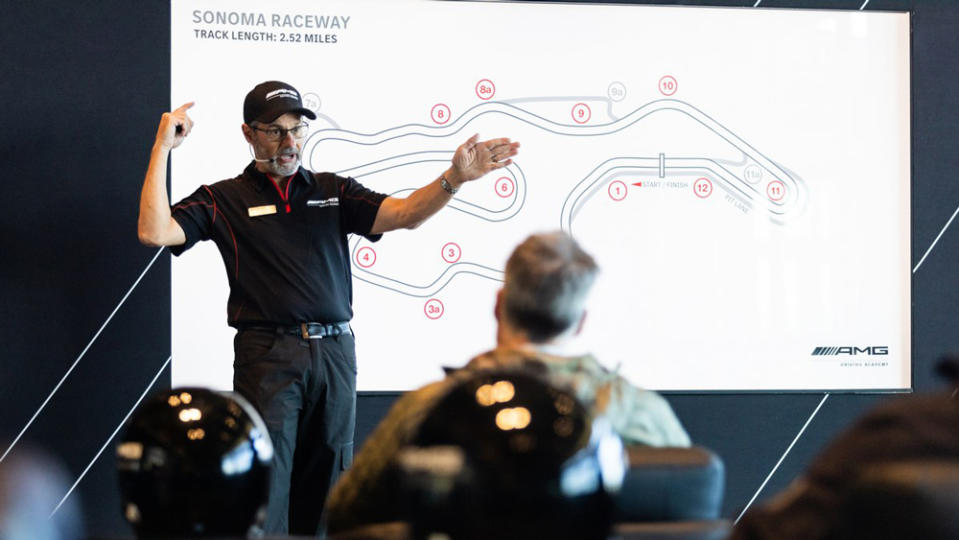 An instructor at the AMG Driving Academy gives a preliminary track briefing at Sonoma Raceway in Sonoma, Calif.