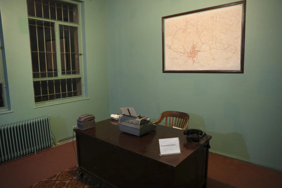 In this Sept. 26, 2019 photo, one of rooms of the former U.S. Embassy in Tehran, now partly a museum, is photographed, in Tehran, Iran. The embassy remains frozen in 1979 as the 40th anniversary of the Iran hostage crisis approaches. (AP Photo/Vahid Salemi)