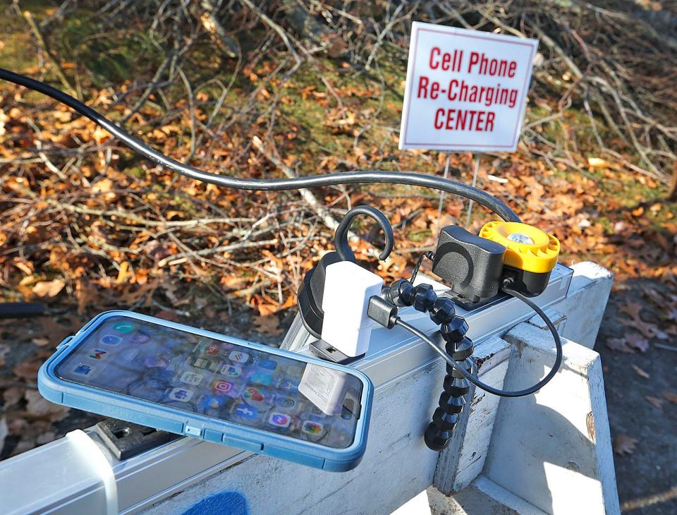 Cell Power, a temporary cellphone charging station, is available on Aaron River Road in Cohasset on Tuesday, Dec. 19, 2023.