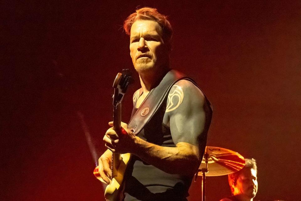 <p>Astrida Valigorsky/Getty</p> Tim Commerford of Rage Against the Machine performing in New York City in August 2022