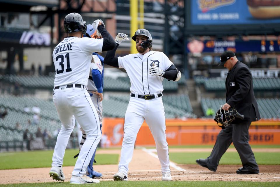 Detroit Tigers designated hitter Eric Haase (13) (right) celebrates with Detroit Tigers center fielder Riley Greene (31) after hitting a three-run home run off New York Mets starting pitcher Joey Lucchesi (47) (not pictured) in the first inning at Comerica Park in Detroit on Wednesday, May 3, 2023.
