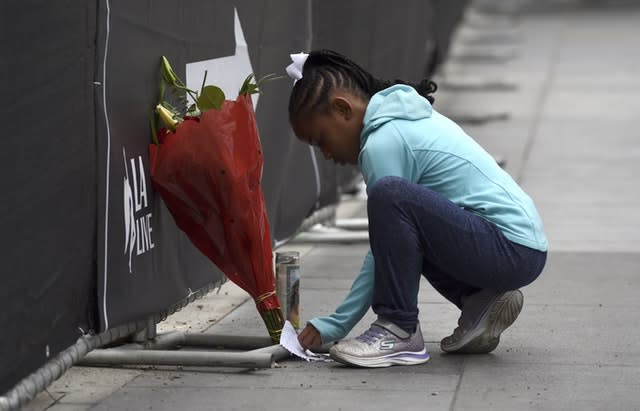 Dharma Brown, an eight-year-old, paid her respects