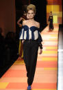 <b>Jean Paul Gaultier SS13 </b><br><br>The collection featured bandeau tops in striped print teamed with tapered trousers.<br><br>© Rex