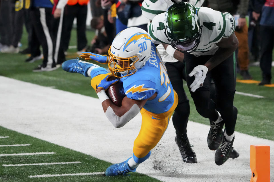 Nov 6, 2023; East Rutherford, New Jersey, USA; Los Angeles Chargers safety Derwin James Jr. (3) drives with the ball against New York Jets cornerback D.J. Reed (4) during a football game at MetLife Stadium. Mandatory Credit: Robert Deutsch-USA TODAY Sports