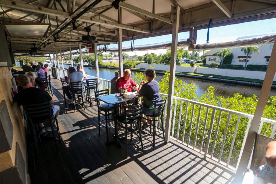 They have a deck overlooking a canal. Off the Eaten Path: First Round Draft in Cape Coral, a restaurant run by two sisters and their stepmother.