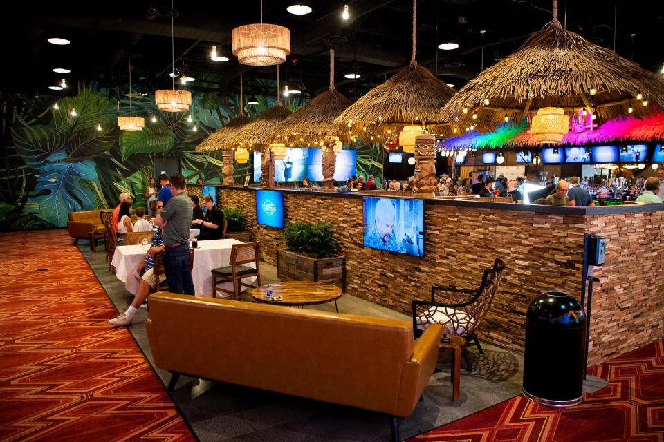 Guy Fieri's Downtown Flavortown in Pigeon Forge has a tiki bar and an arcade.
