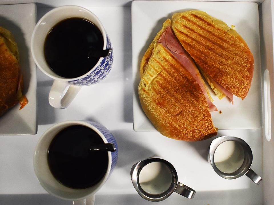 A panini and coffee are served up at Europa Pastries in Fall River, which recently celebrated 25 years in the city.