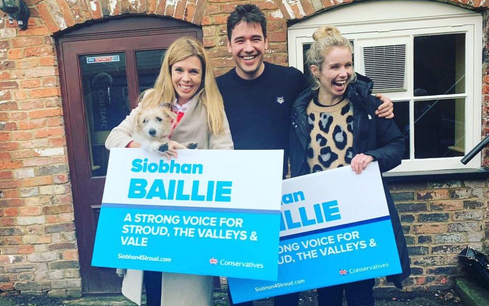 Henry Newman and Carrie Symonds (left) out campaigning before the 2019 election