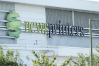 Signage of the Newsprinters printing works at Broxbourne, Hertfordshire, protesters continue to use bamboo lock-ons and a van to block the road. (Photo by Yui Mok/PA Images via Getty Images)