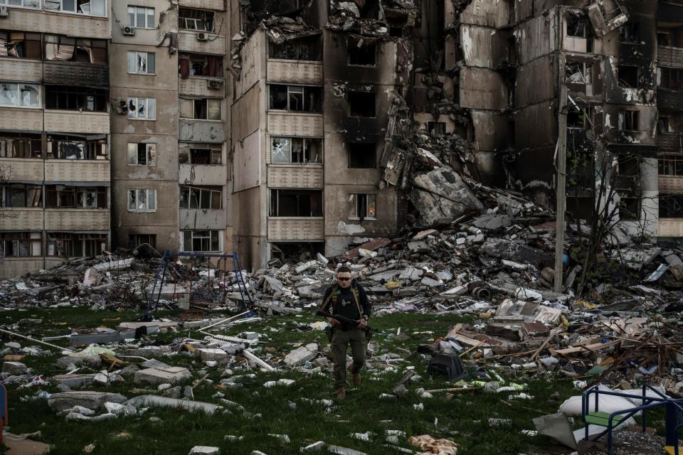 Russian bombardment reduced a building to rubble in Kharkiv, Ukraine.