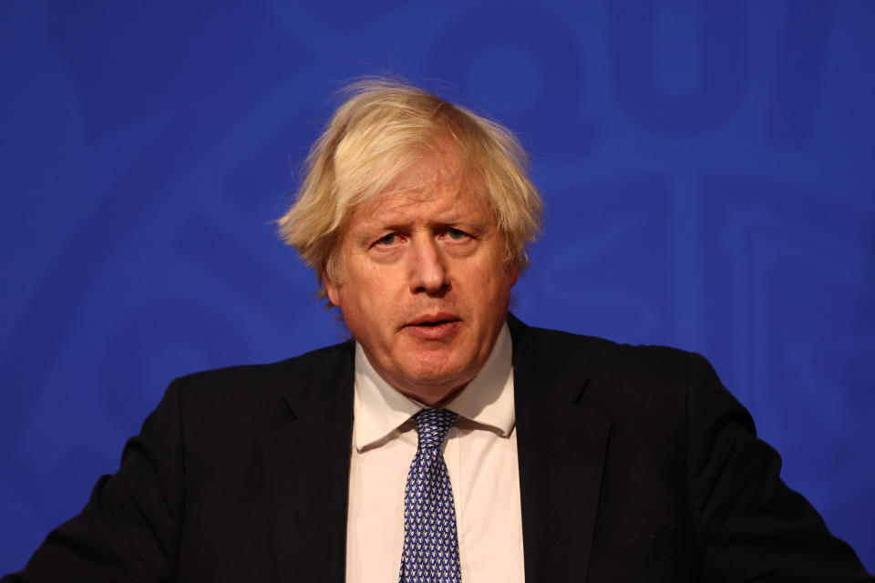 Prime Minister Boris Johnson speaking at a press conference in London's Downing Street after ministers met to consider imposing new restrictions in response to rising cases and the spread of the Omicron variant. Picture date: Wednesday December 8, 2021.
