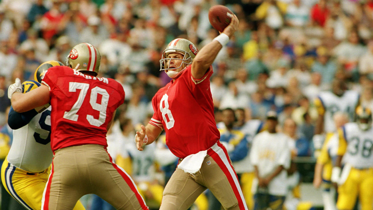 Young San Francisco 49ers' quarterback Steve Young (8) throws a pass against the Los Angeles Rams in Anaheim Stadium49ERS YOUNG, ANAHEIM, USA.