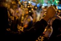 A demonstrator raises his fist during a rally after the death of Walter Wallace Jr., a Black man who was shot by police in Philadelphia