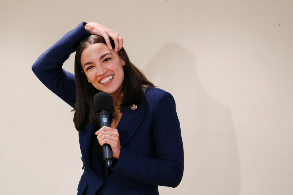 Rep. Alexandria Ocasio-Cortez, D-N.Y., smiles during a town hall in New York last week. (Lucas Jackson/Reuters)