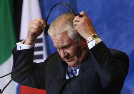 FILE PHOTO: U.S. Secretary of State Rex Tillerson removes his headphones used for translation during a news conference during the Foreign Ministers’ Meeting on Security and Stability on the Korean Peninsula in Vancouver, British Columbia, Canada, January 16, 2018.  REUTERS/Ben Nelms