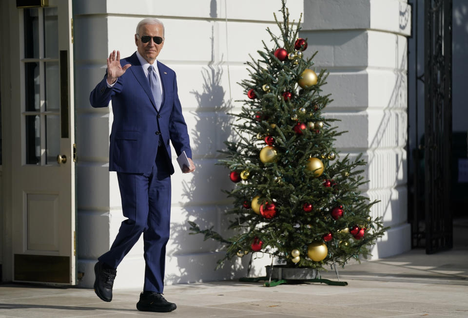 President Joe Biden waves as he walks to board Marine One on the South Lawn of the White House, Friday, Dec. 8, 2023, in Washington. (AP Photo/Evan Vucci)