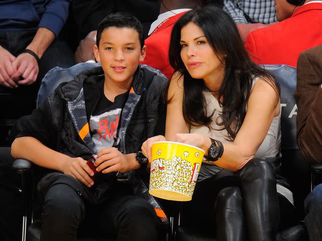 <p>Noel Vasquez/GC Images</p> Lauren Sanchez and her son Nikko Gonzalez attend a basketball game between the Indiana Pacers and the Los Angeles Lakers at Staples Center on January 28, 2014.