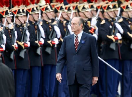 FILE PHOTO: French President Jacques Chirac attends ceremonies at the Arc de Triomphe in Paris