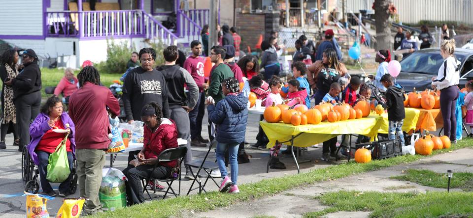 Local residents enjoy activities during the community bazaar put on by Sonia Brown also known as Auntie Na Saturday, October 19, 2019 in Detroit, Mich.