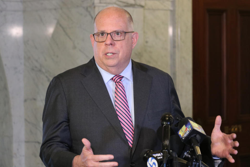 FILE - Maryland Gov. Larry Hogan talks to reporters, April, 4, 2022. “The month of May is going to be a critical window into where we are,” said Hogan, a Trump critic defending incumbent GOP governors in Georgia, Ohio and Idaho against Trump-backed challengers this month. “I'm just concerned that there are some people trying to tear the party apart or burn it down.” (AP Photo/Brian Witte, File)