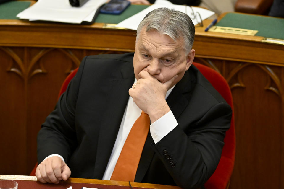 Hungarian Prime Minister Viktor Orban sits after addressing a parliament session, on the day lawmakers are expected to approve Sweden's accession into NATO, in Budapest, Hungary, Monday, Feb 26, 2024. Hungary's parliament is to vote Monday on ratifying Sweden's bid to join NATO, likely bringing an end to more than 18 months of delays that have frustrated the alliance as it seeks to expand in response to Russia's war in Ukraine. (AP Photo/Denes Erdos)