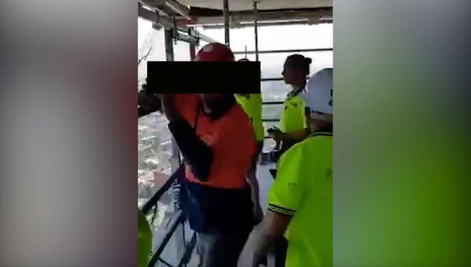 The video has gone viral, but there were multiple workmen filming the couple. Photo: Facebook