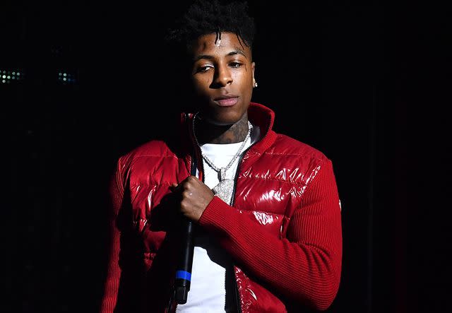 <p>Paras Griffin/Getty</p> NBA YoungBoy performs onstage during Lil Baby & Friends concert to promote the new release of Lil Baby's new album "Street Gossip" on November 29, 2018 in Atlanta, Georgia.